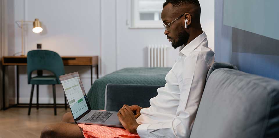 An african american male is studying for an associates degree in cyber security