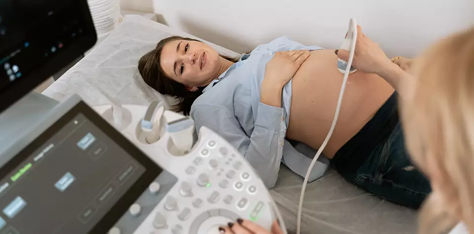 A pregnant patient is getting a sonogram
